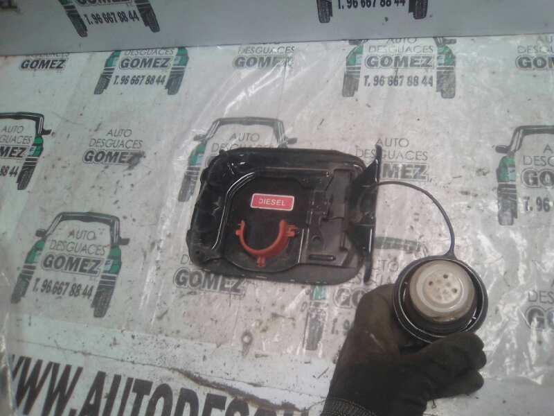 TAPA EXTERIOR COMBUSTIBLE NISSAN XTRAIL (T30) (2001